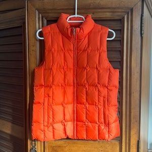 Women’s medium orange puffy GAP vest - winter wear. Like new!